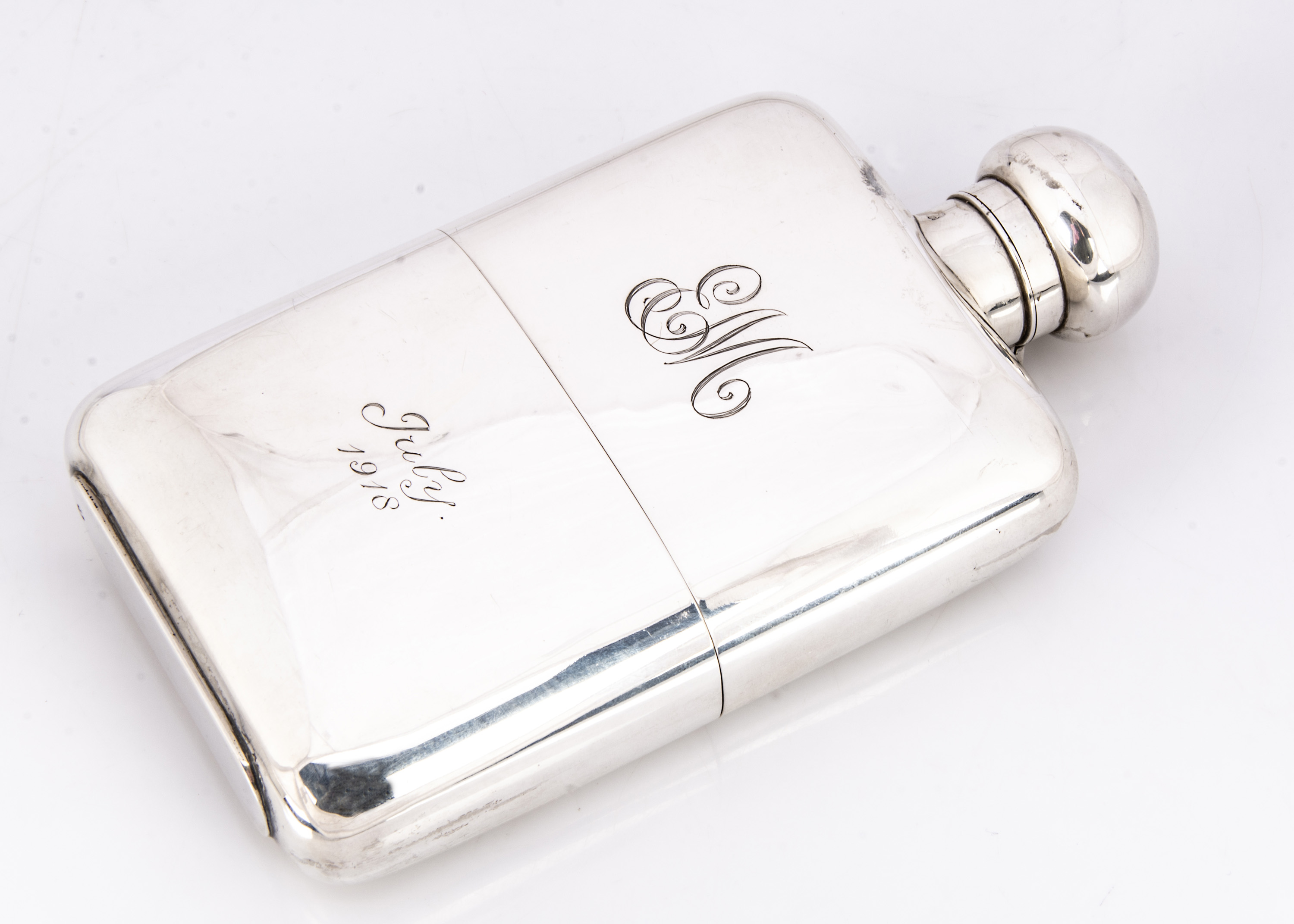 Lot 286 - A George V silver hipflask by GN GN