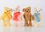 A set of Steiff Swarovski four seasons teddy bears