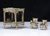Lot 8 - An unusual glass bead and twig dolls’ house four-poster bed